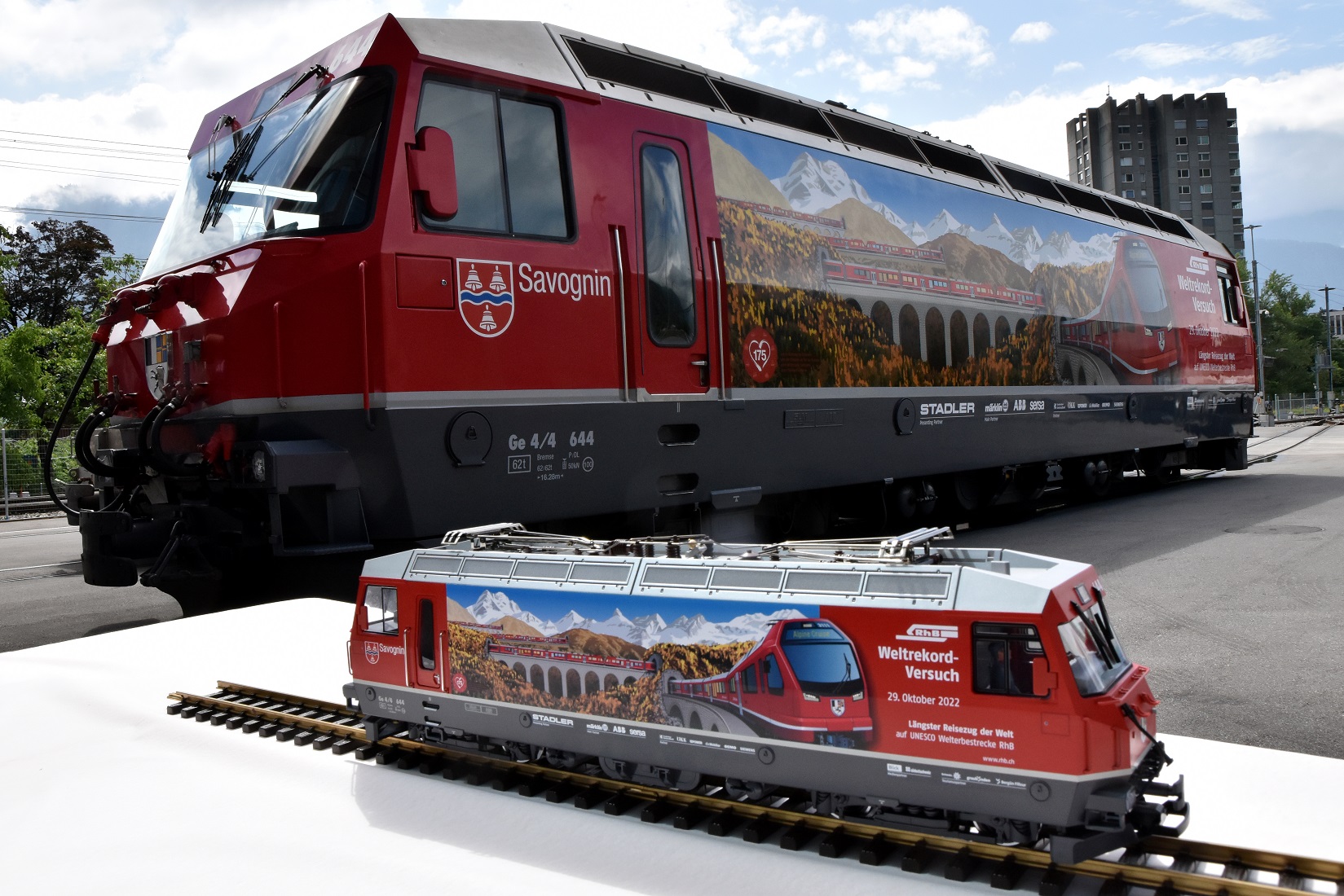 The scene is Landquart depot on 29th June 2022 (exact four months before the record attempt) when both this Märklin model and the specially decorated Ge 4/4 locomotive 'Savognin' were launched simultaneously - behind is the real locomotive and in front is the scale model.